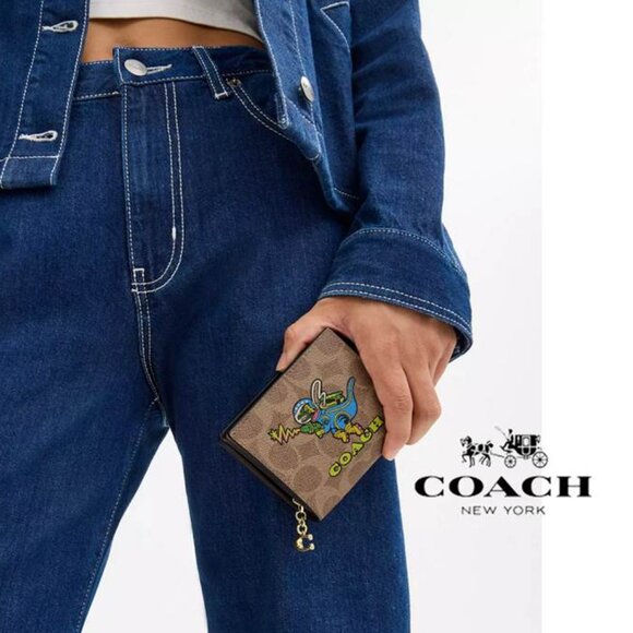 Cosmic Coach Snap Wallet In Signature Canvas With Rexy Dinosaur NWT - Picture 2 of 6